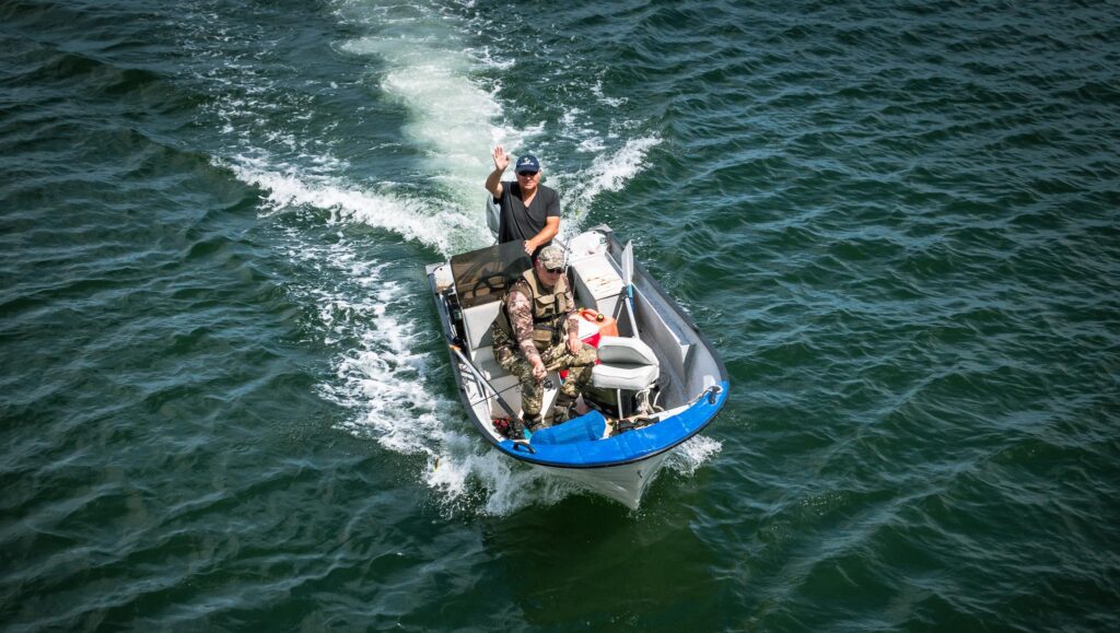 Fisherman on a boat in Quebec