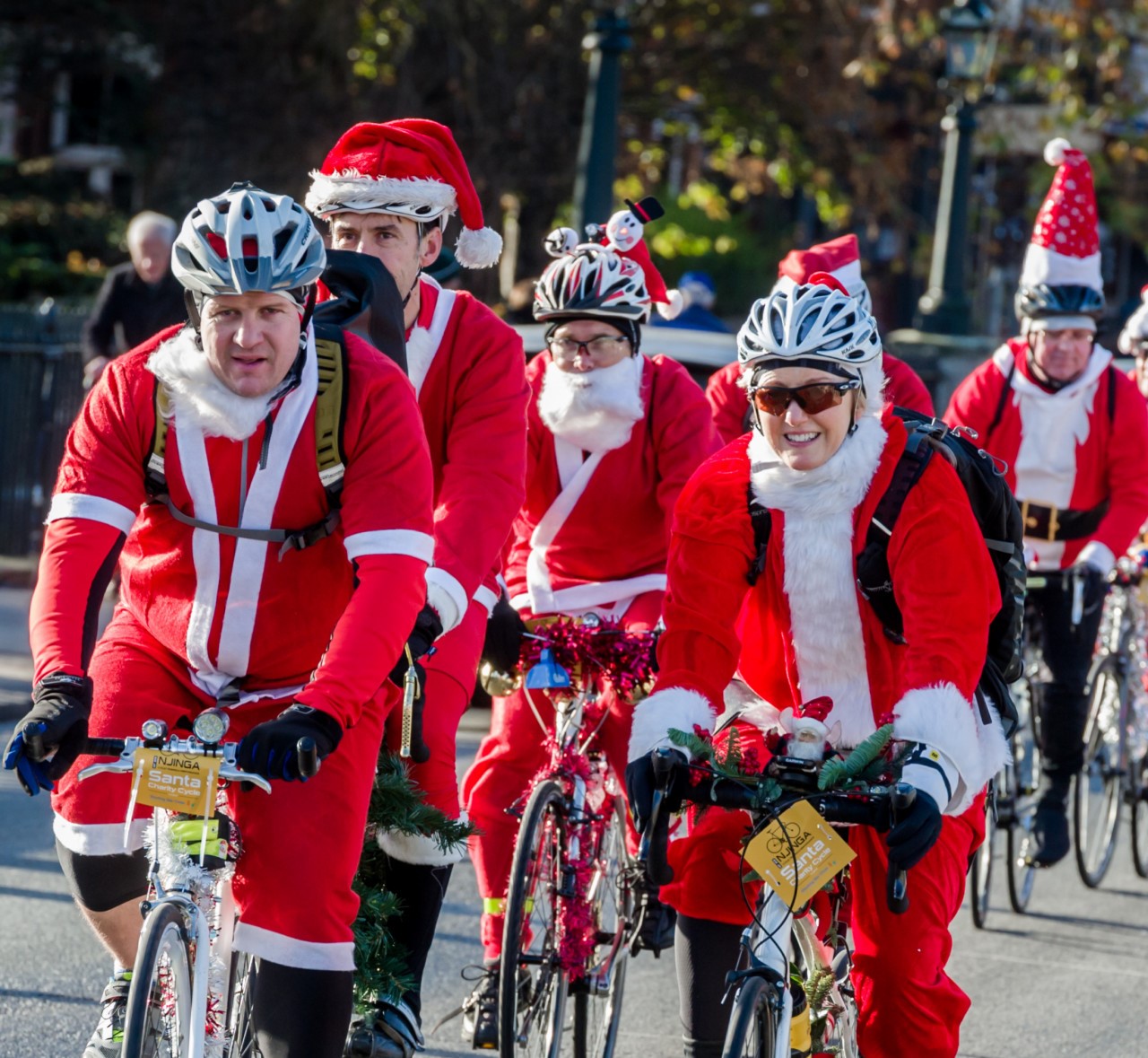 Cyclists dressed as Santa Claus