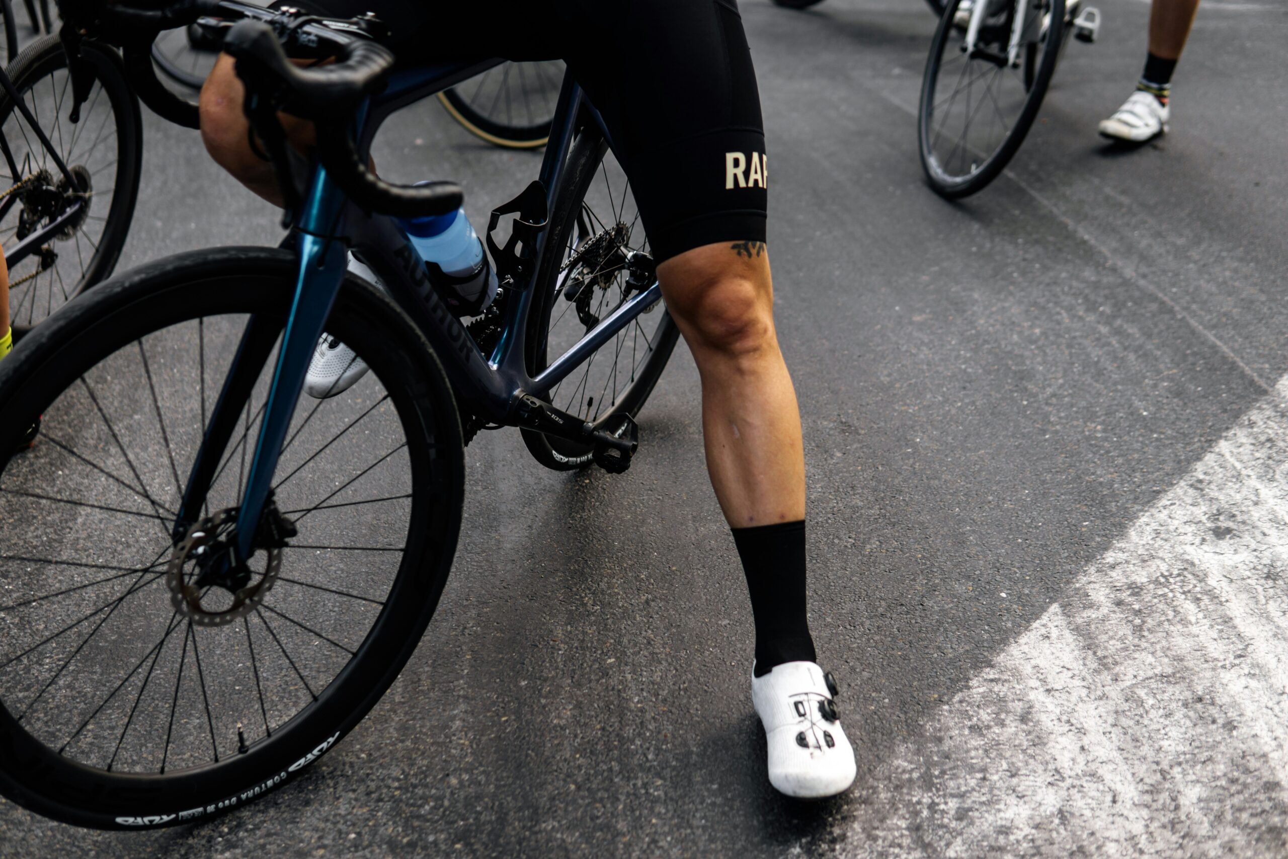 a cyclist sat on his bicycle frame