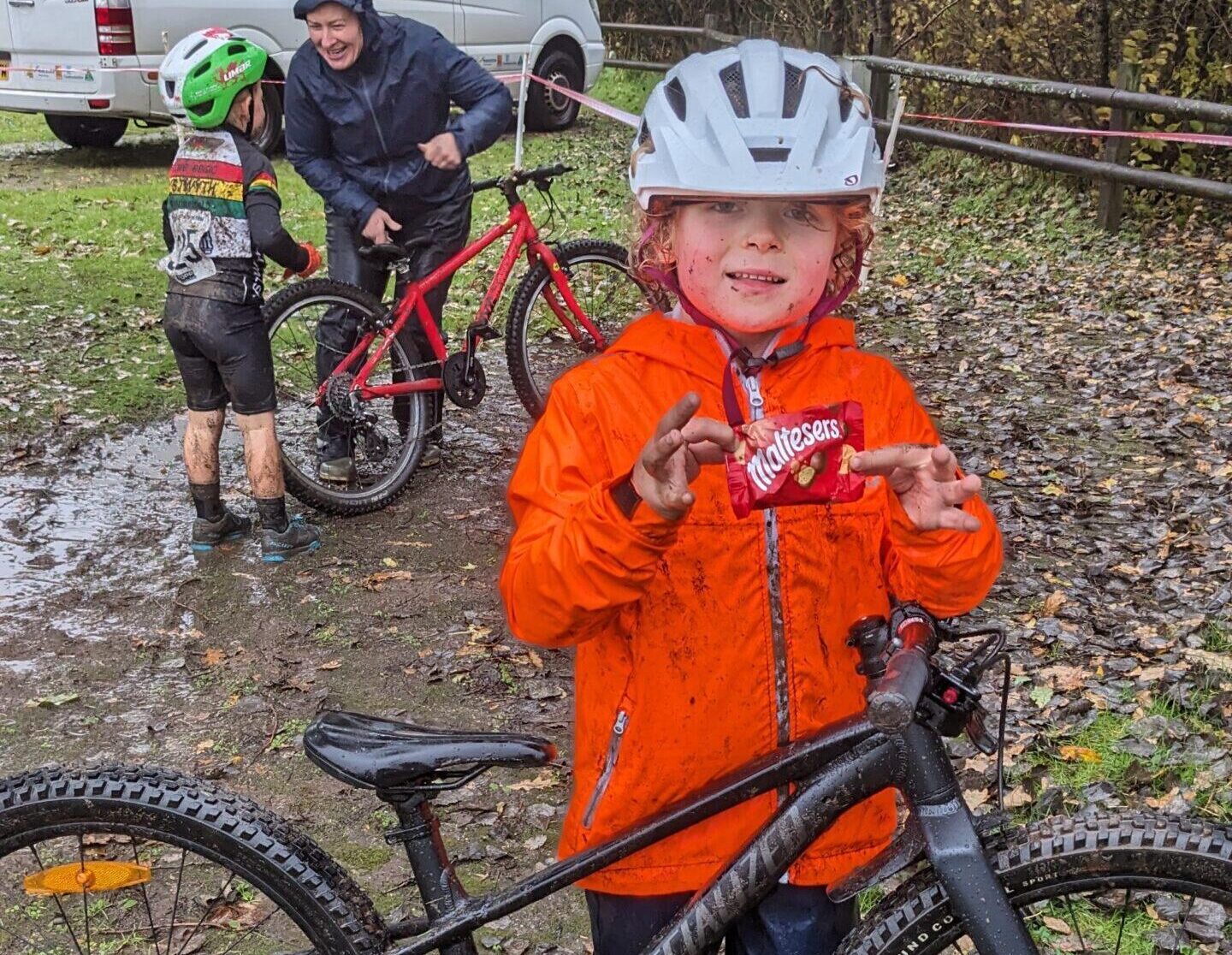 a child at a cyclocross race