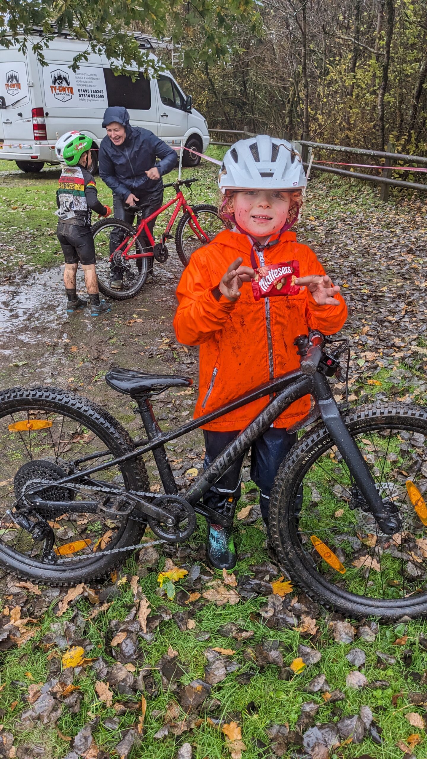 a child at a cyclocross race